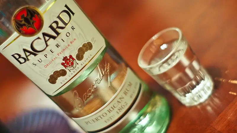 Bacardi Superior in a bottle and shot glass