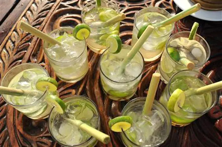 African cocktails (Dawa) on a carved tray