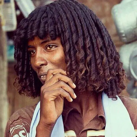 A Somali man with traditional hairstyle