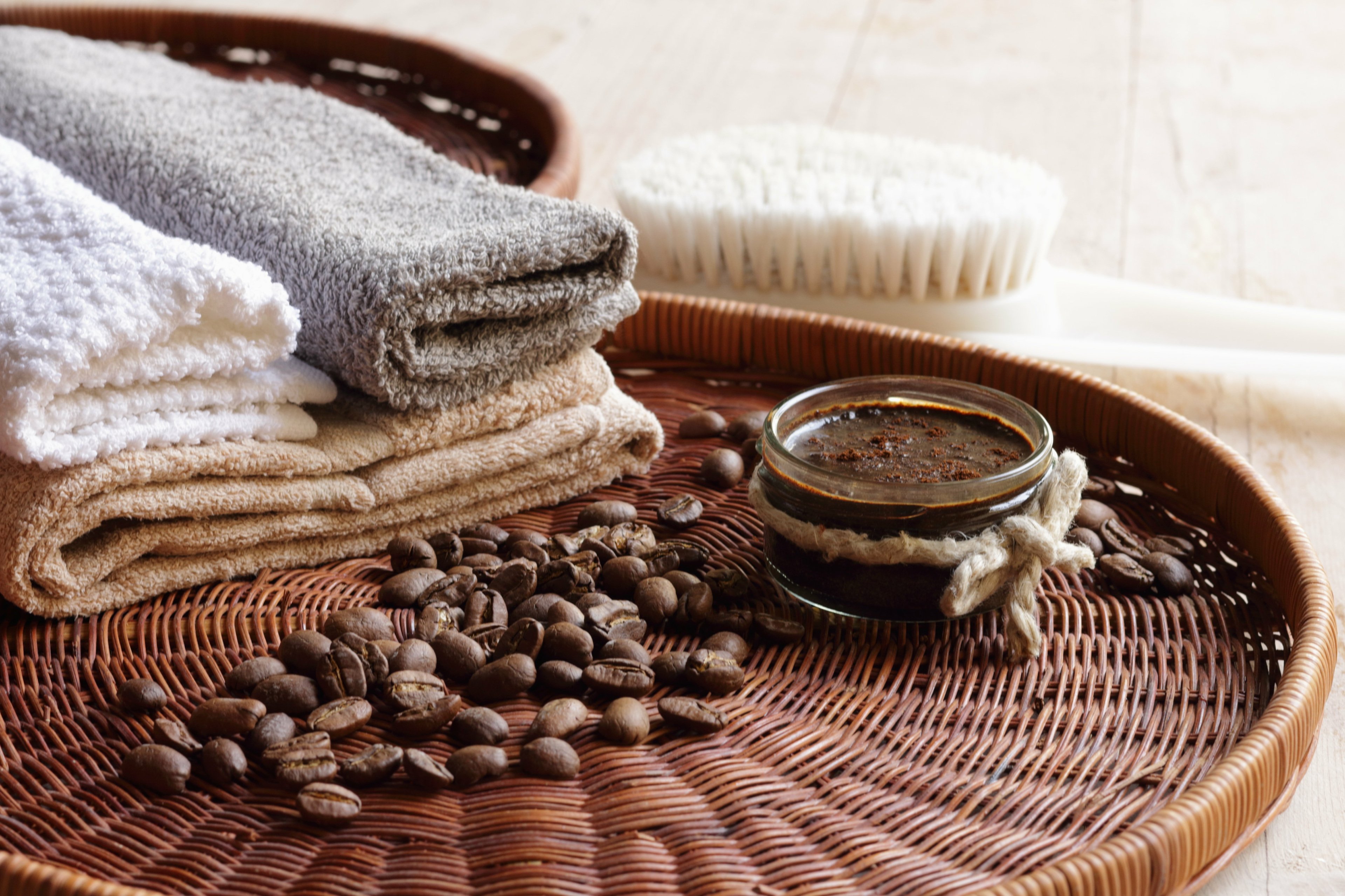 Coffee body scrub with towels and scrub brush