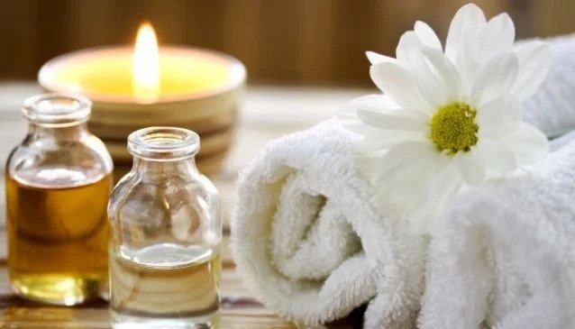 Oils, candle, flowers and towel at Lemon spa Arusha - massage dar es salaam tanzania