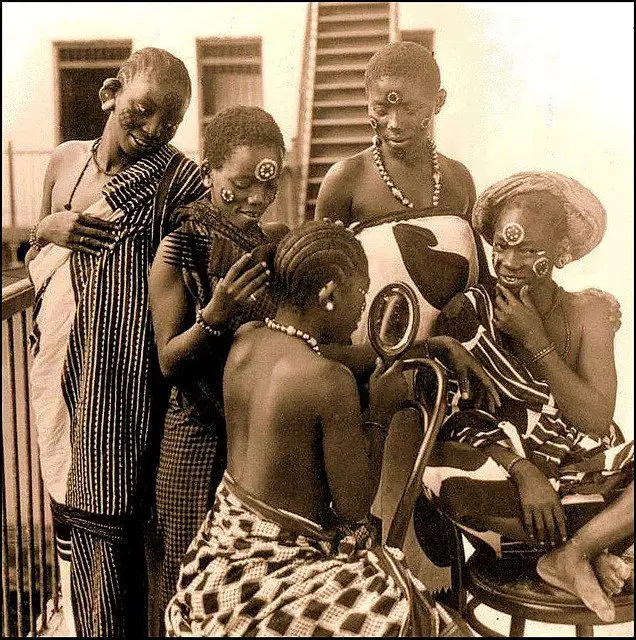 Swahili Zanzibari Girls Braiding Hair into Simple Plaits