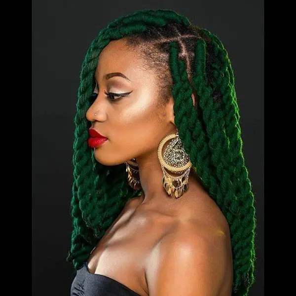 Chunky green twisted braids on dark skin