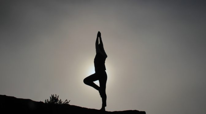 Backlit yoga pose
