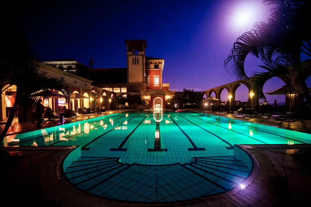 The swimming pool at Lake Victoria Serena Golf Resort & Spa at night