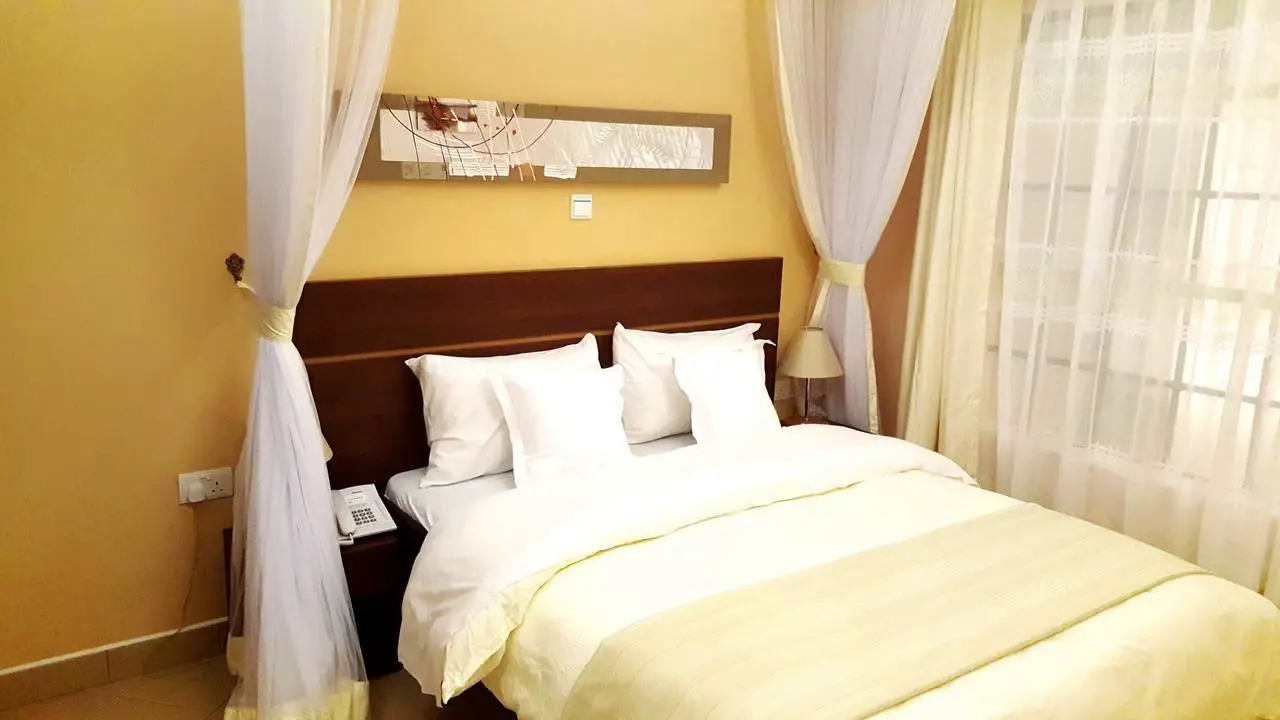 A bed at Capital Heights Hotel in Nairobi