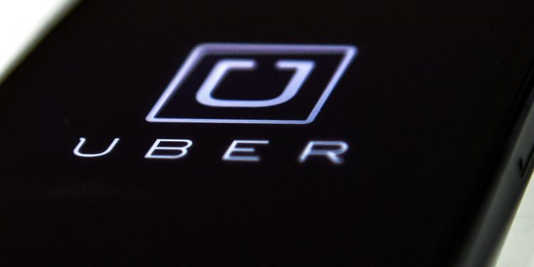 uber Tanzania contacts: Uber Tanzania Logo on phone screen