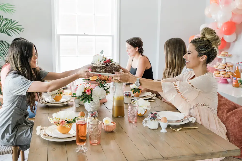 tips for budget bridal showers: people at a bridal shower