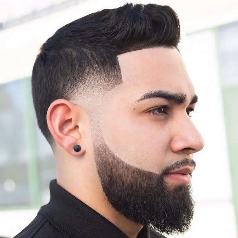 What is barbing?: a neatly barbed faded hairstyle with beard