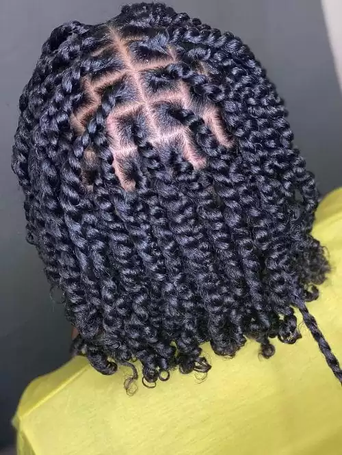 the beginning of two strand twists to dreads