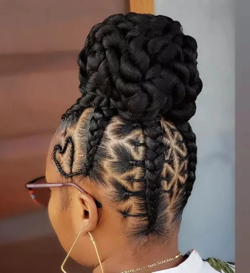 braid updo hairstyles: cornrowed box braids with hear with a braided bun