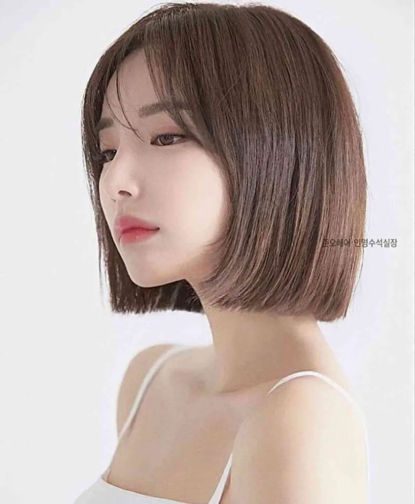 blunt cut Asian short hair on a woman